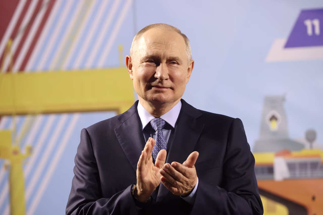 Russian President Vladimir Putin applauds while visiting the Zvezda Shipbuilding Complex, in Bolshoi Kamen, outside of Vladivostok, Russia, on September 11.