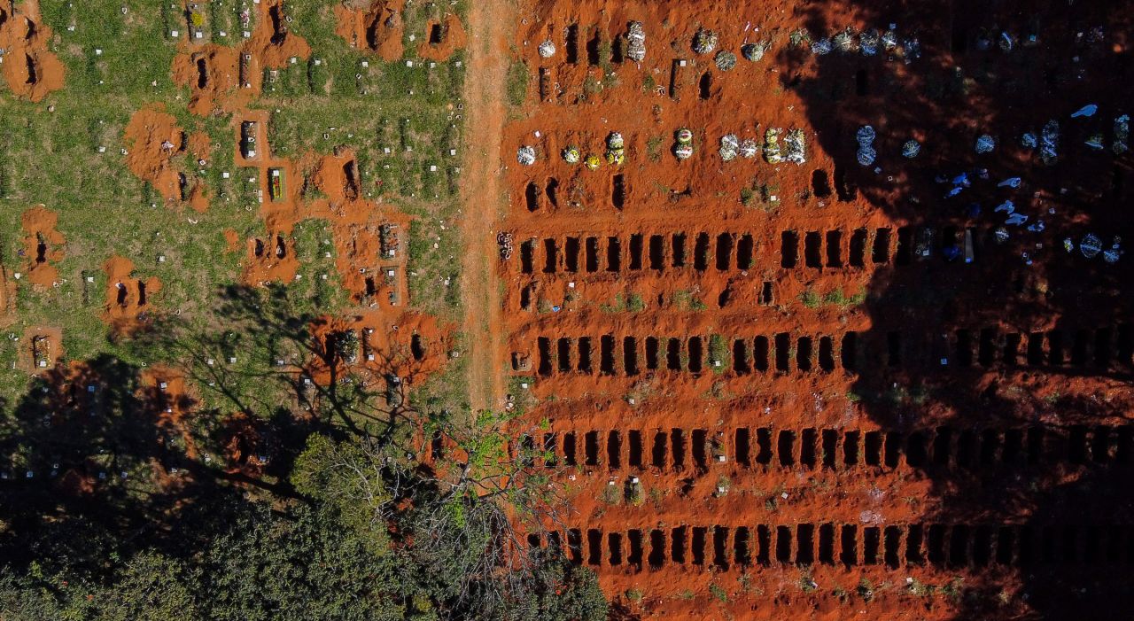 This aerial photo shows freshly dug graves at the Vila Formosa cemetery in Sao Paulo, Brazil, on Sunday.