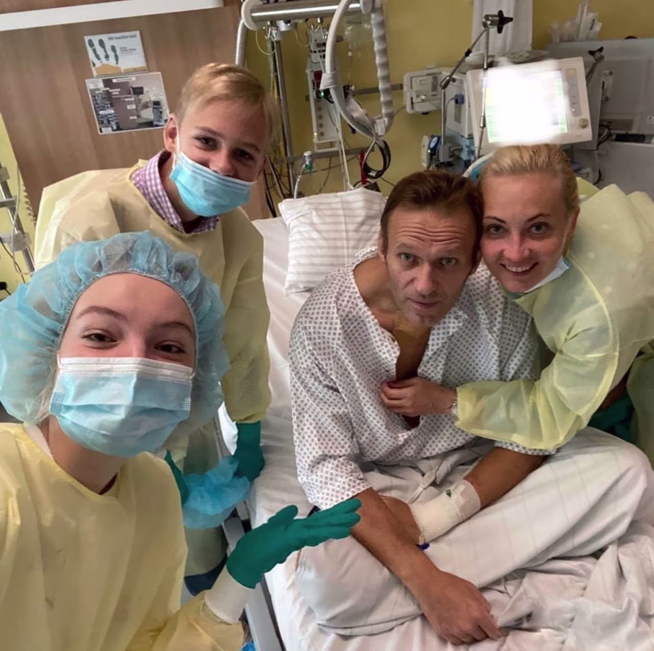 Navalny is surrounded by his wife, Yulia, and two children, Zakhar and Daria, while on a hospital bed in Berlin in September 2020. On social media, he said he was breathing on his own without medical support.