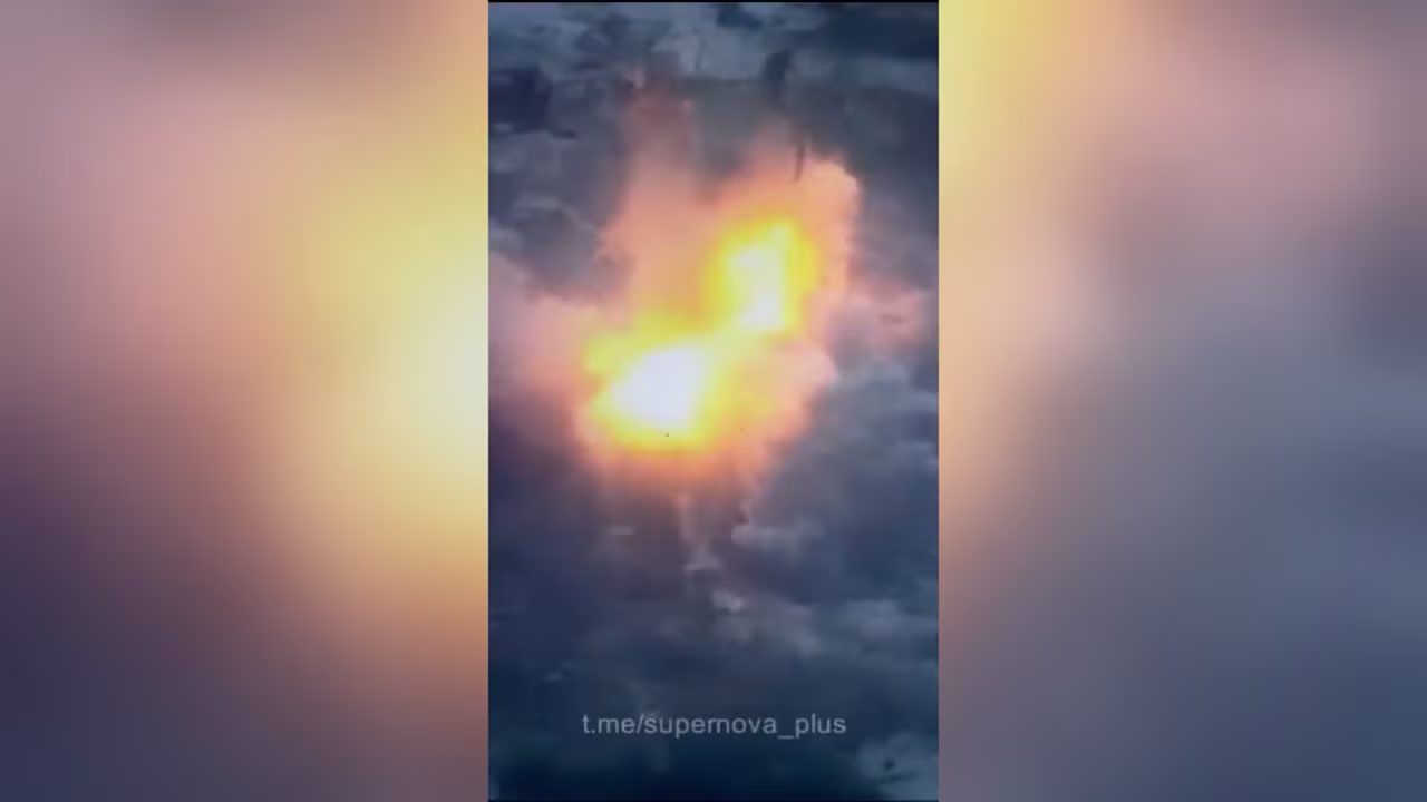 In this still taken from video, an explosion can be seen at a building that appears to have been a shelter for Russian troops.