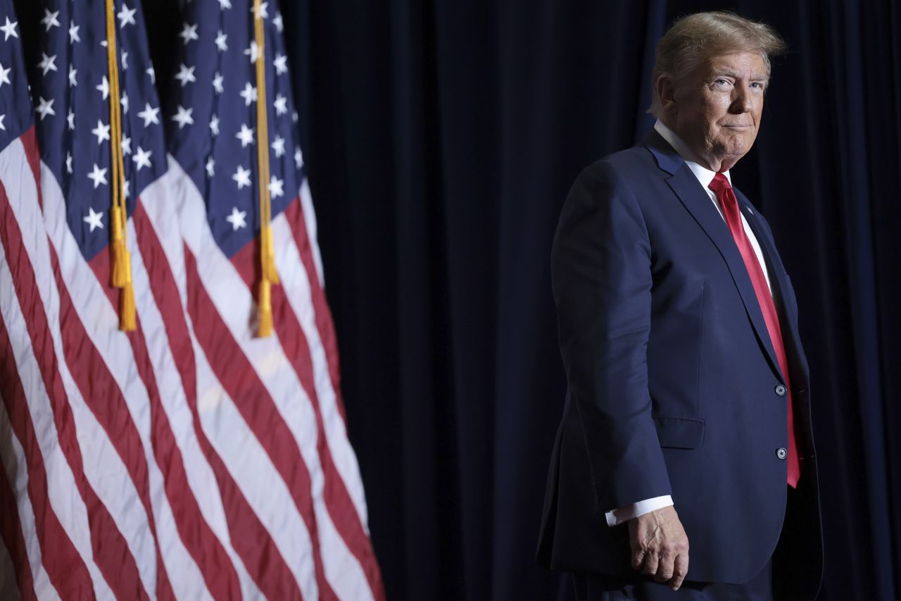 Former President Donald Trump arrives on stage for a rally in North Charleston, South Carolina, on February 14.