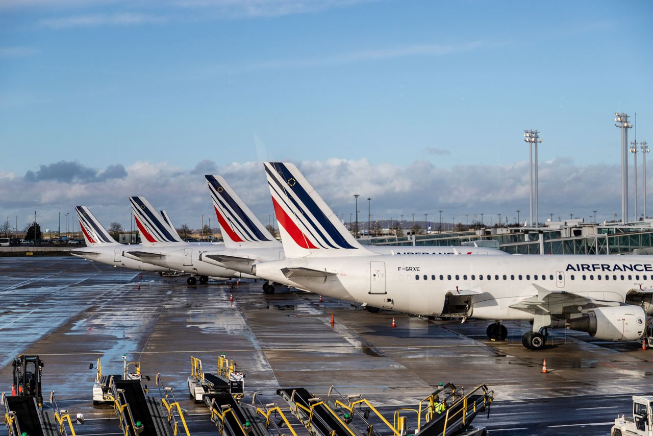 Air France passenger aircraft stand on the tarmac at Charles de Gaulle airport in Roissy, France, on Tuesday, January 28.