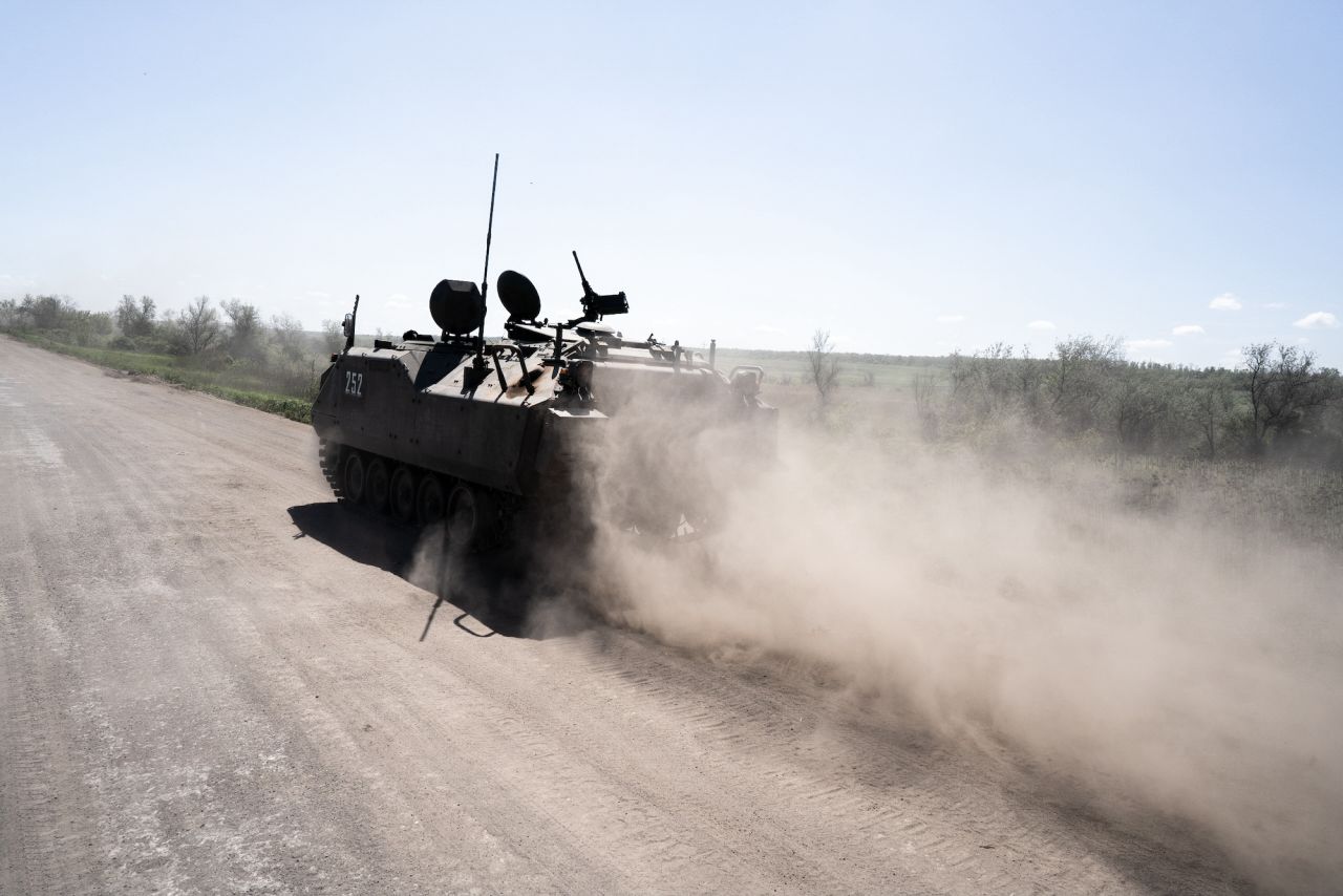 An armored infantry carrier is seen driving to the front line south of Bakhmut on May 17.