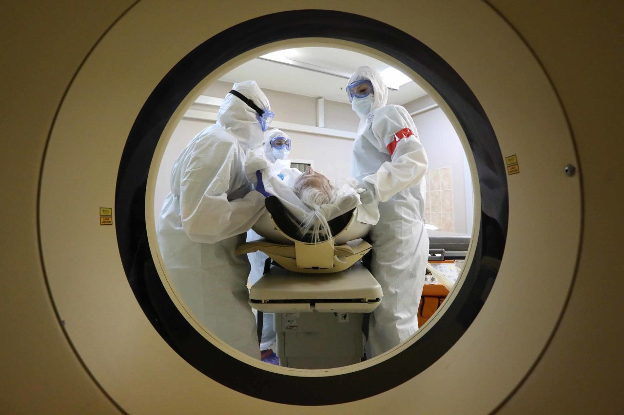 Medical workers treat a patient at Pirogov City Clinical Hospital 1 in Moscow, Russia, on April 20.