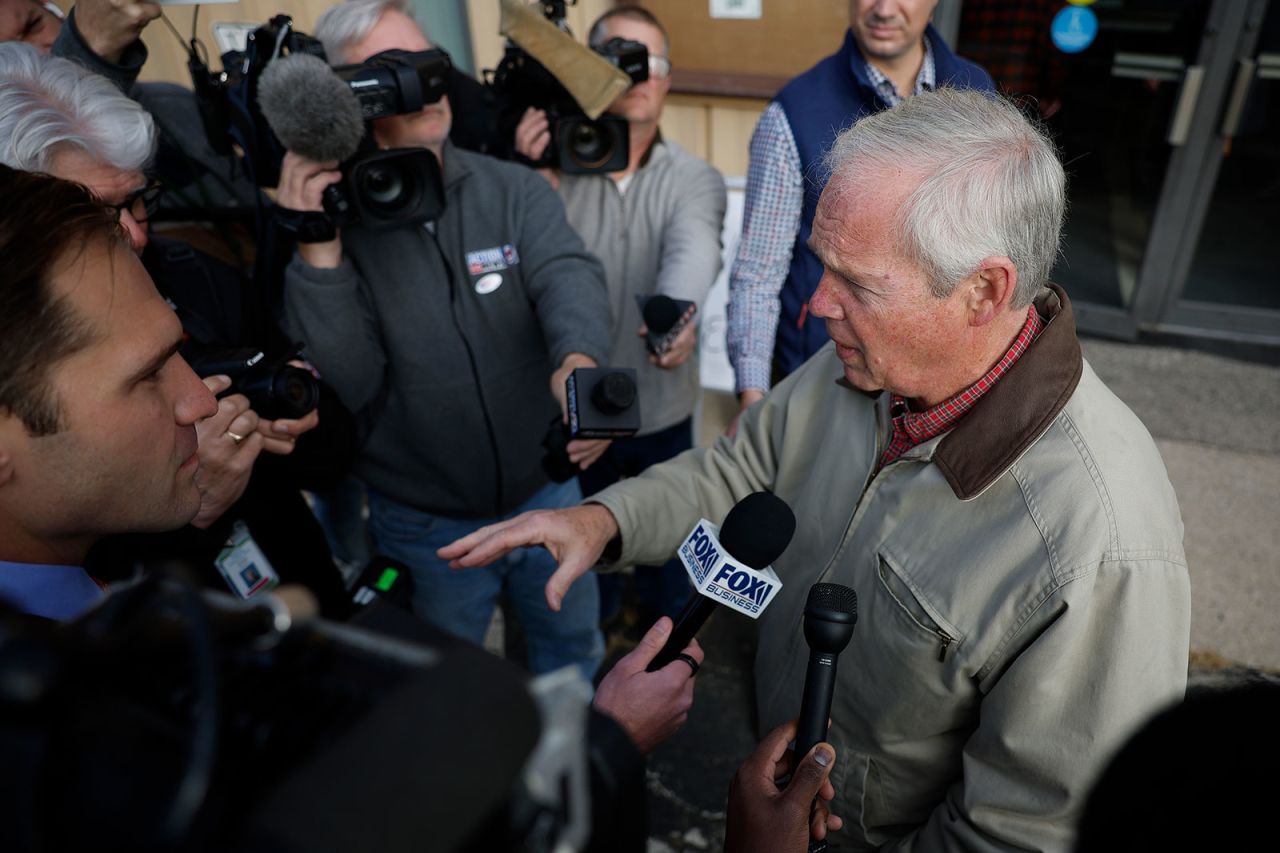 Wisconsin Sen. Ron Johnson talks to reporters after casting his ballot on November 8, in Oshkosh, Wisconsin. 