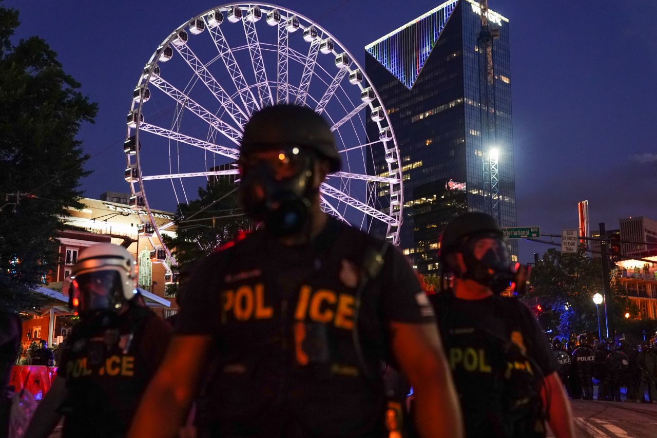 Police officers are seen during a demonstration in Atlanta on Sunday, May 31.