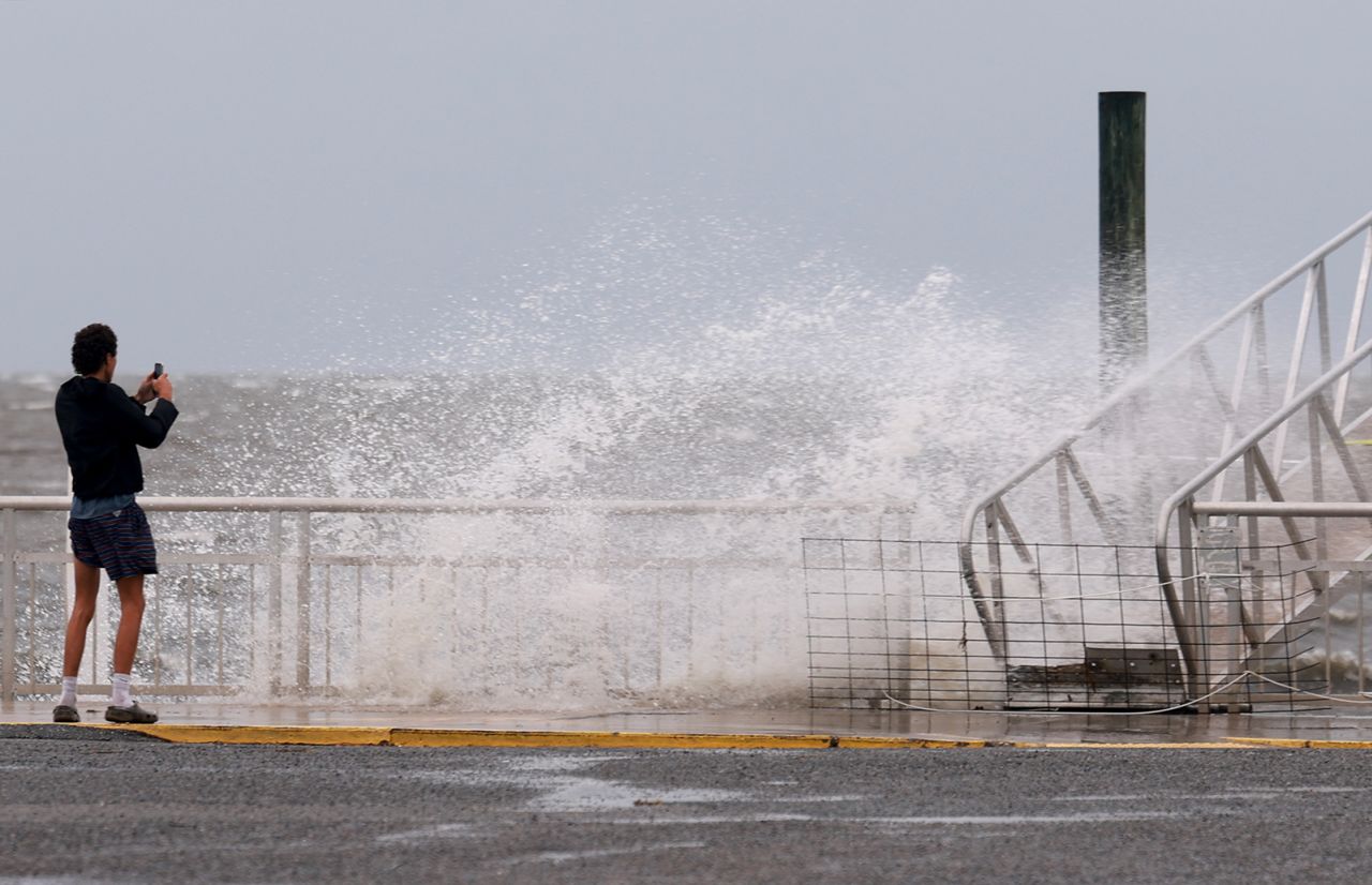 A wave crashes ashore as the region prepares for the possible arrival of Debby in Cedar Key, Florida, on August 4.