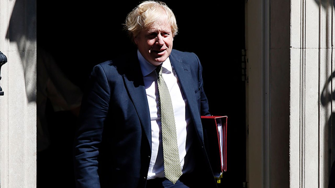 UK Prime Minister Boris Johnson leaves Downing Street to attend Prime Minister's Questions, his first since recovering from Covid-19, at the House of Commons on May 6, 2020 in London.