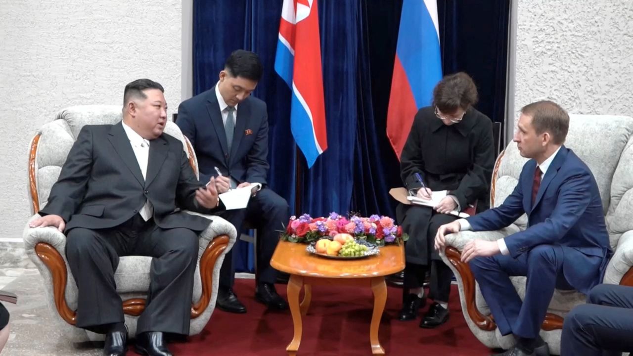 North Korean leader?Kim?Jong?Un?meets with Russian Minister of Natural Resources and Environment Alexander Kozlov upon his arrival in Khasan in the Primorsky region, Russia, in this still image from video published on September 12.