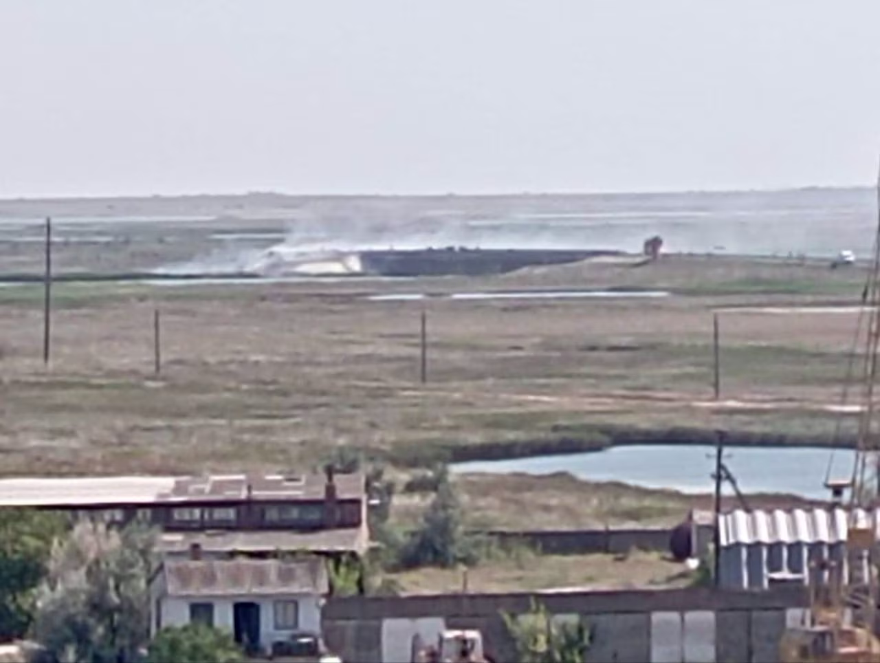 One of the bridges reportedly struck connected the Arabat Spit on Crimea's east coast to the city of Henichesk.