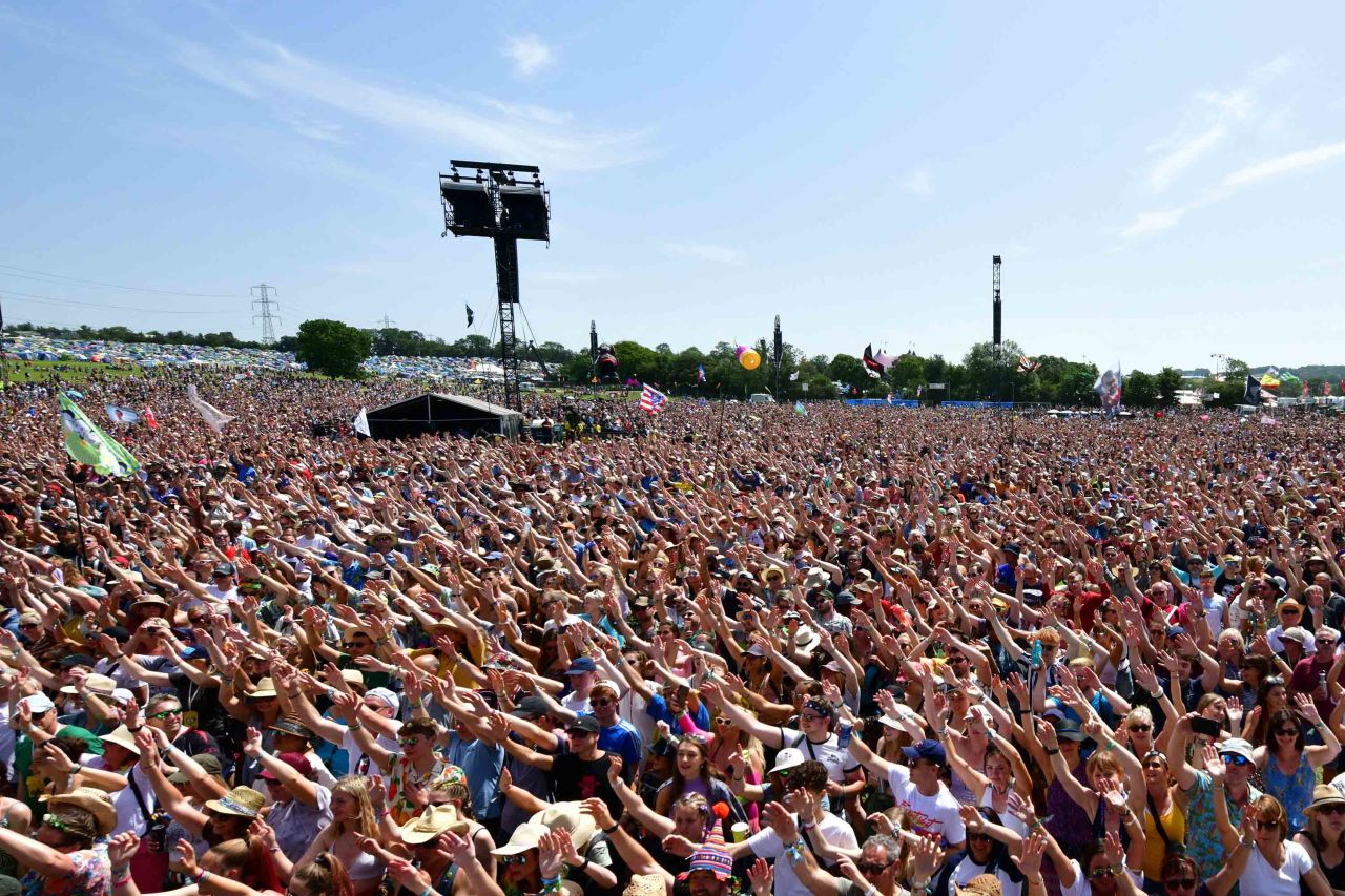 Crowds watch a performance at the Glastonbury Festival in June 2019.