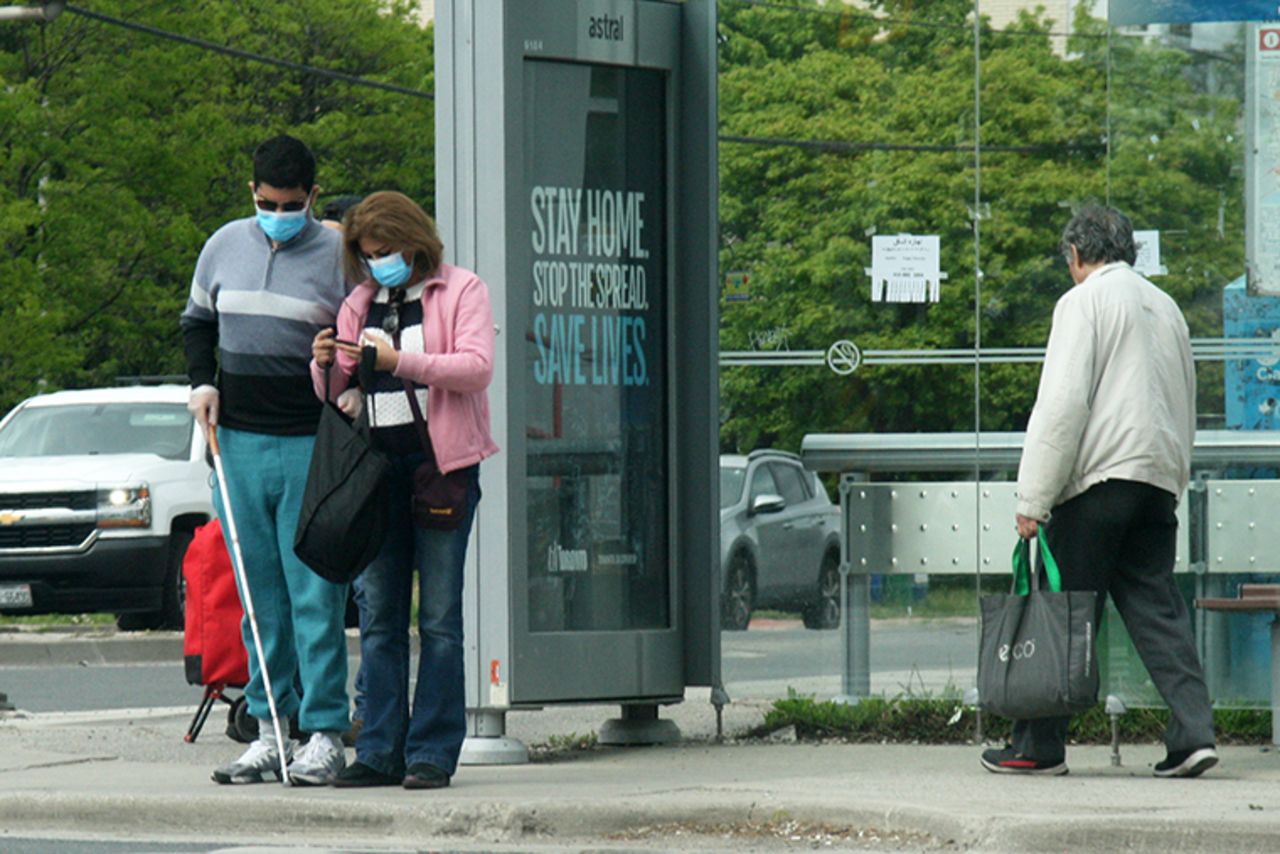 People seen wearing face masks  in Toronto, Ontario, Canada on May 31. 