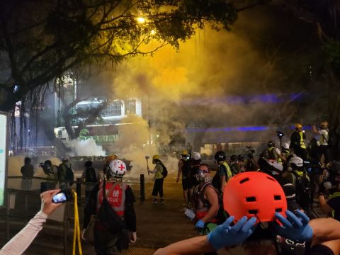 Tear gas is fired for the third time. Ben Westcott/CNN