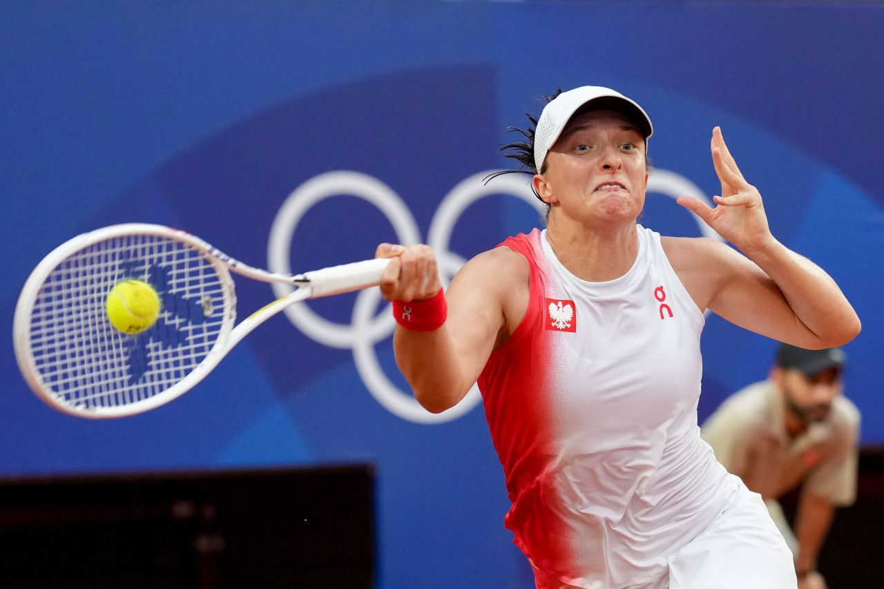 Iga Świątek of Poland hits the ball during her match against Danielle Collins of the United States on Wednesday.