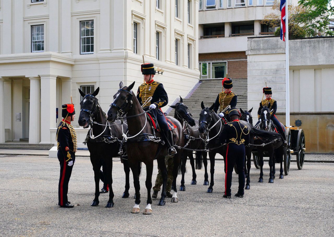 Members of the King's Troop Royal Horse Artillery hitch up the gun carriage at Wellington Barracks on Wednesday.