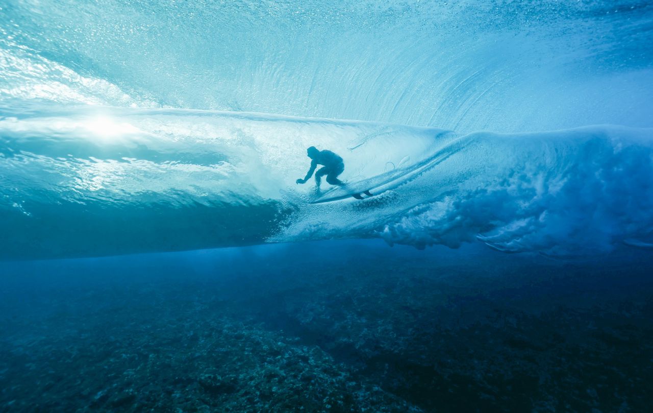 Joan Duru of France gets into the barrel during the men's surfing on July 27, in Teahupo'o, French Polynesia.