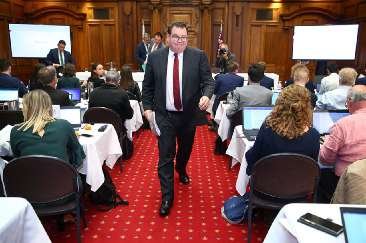 Finance minister Grant Robertson makes an exit at the conclusion of a coronavirus financial response package announcement at Parliament on March 17 in Wellington, New Zealand. 