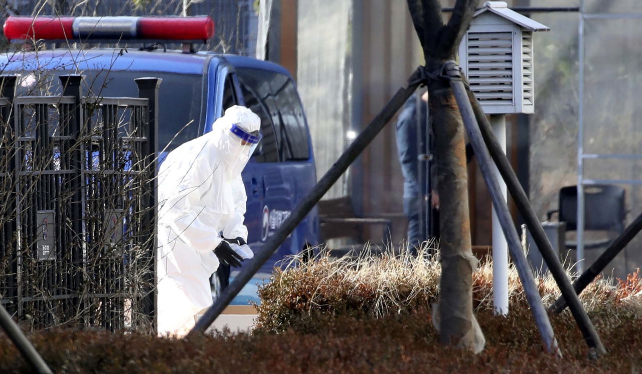 A person wearing protective gear is pictured at Seoul's Dongbu Detention Center in Seoul, South Korea, on December 31, 2020.