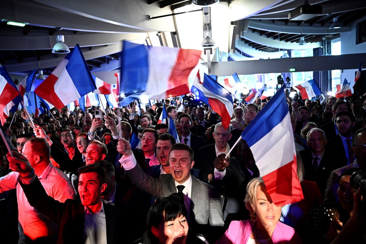 Supporters of France's National Rally (RN) celebrate at an election night event in Paris on June 9. 