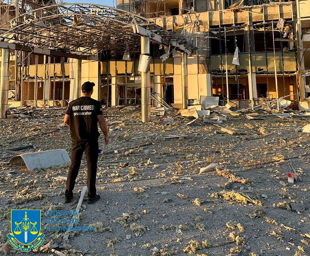 A member of?Odesa?Regional Prosecutor's Office personnel inspects damage following a Russian military attack in?Odesa, Ukraine, in this image released on September 25.