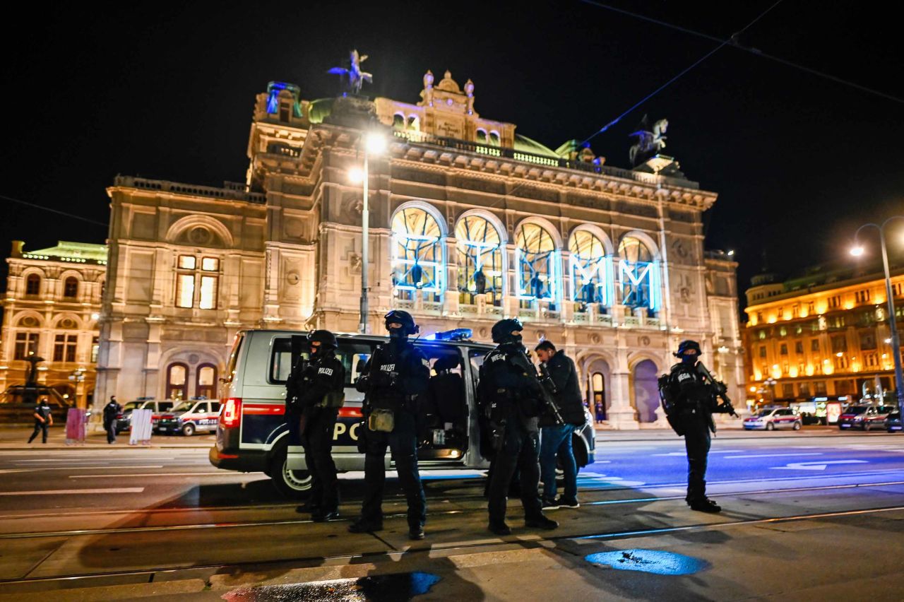 Heavily armed police stand outside the Vienna State Opera after shots were fired in the city center on Monday night. 