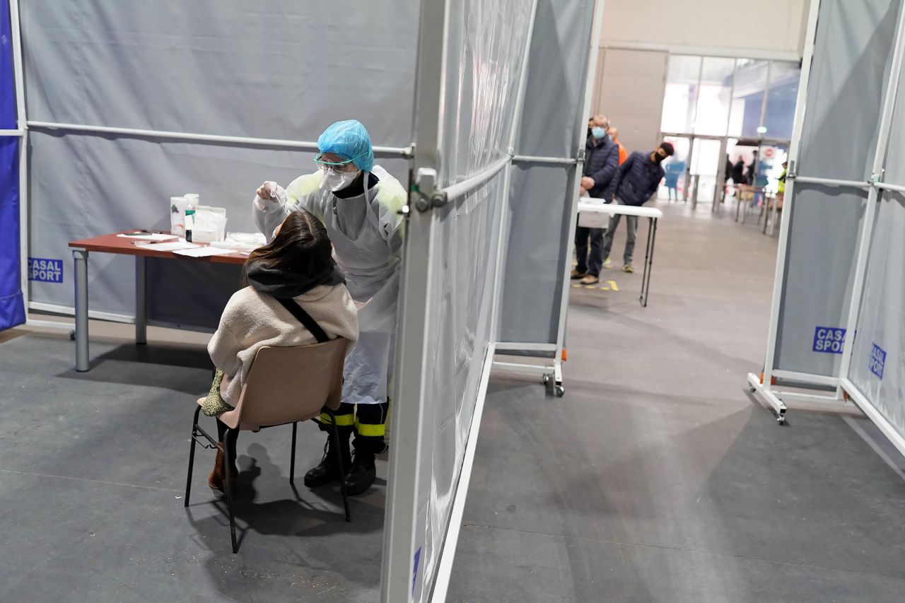 A medical worker administers a nasal swab to a patient at a coronavirus testing center in Dunkirk, France on February 18. 