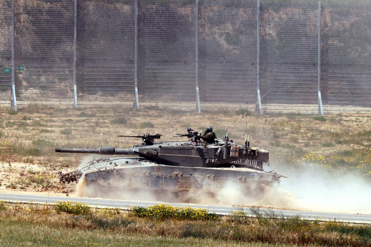 An Israeli army tank moves along the border of Gaza and southern Israel on April 4. 