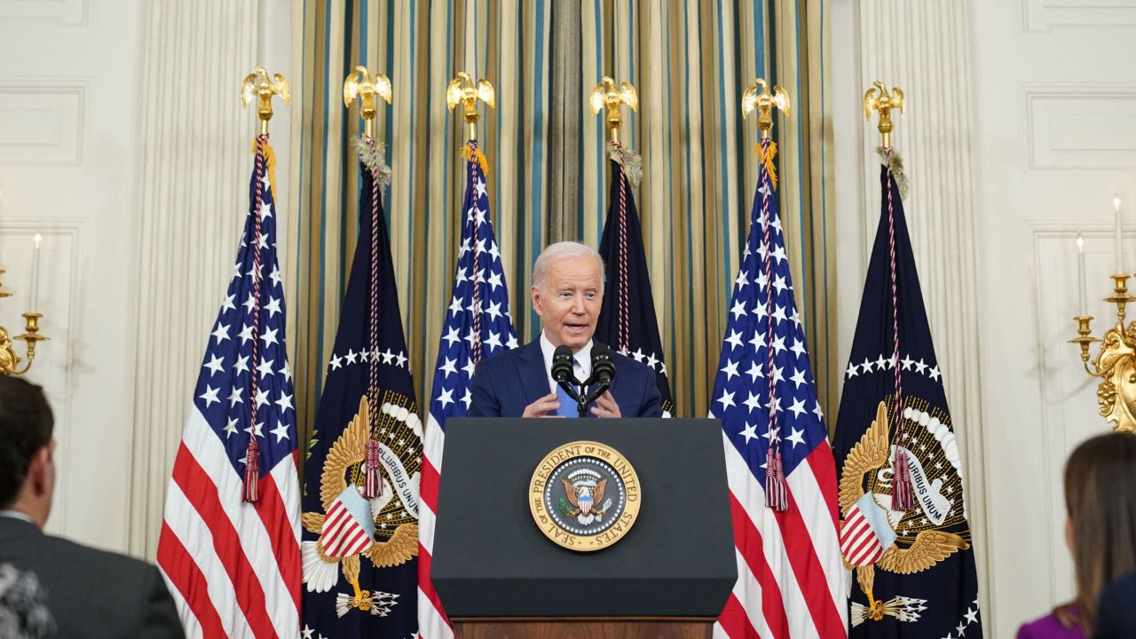 President Joe Biden speaks from the State Dining Room at the White House.