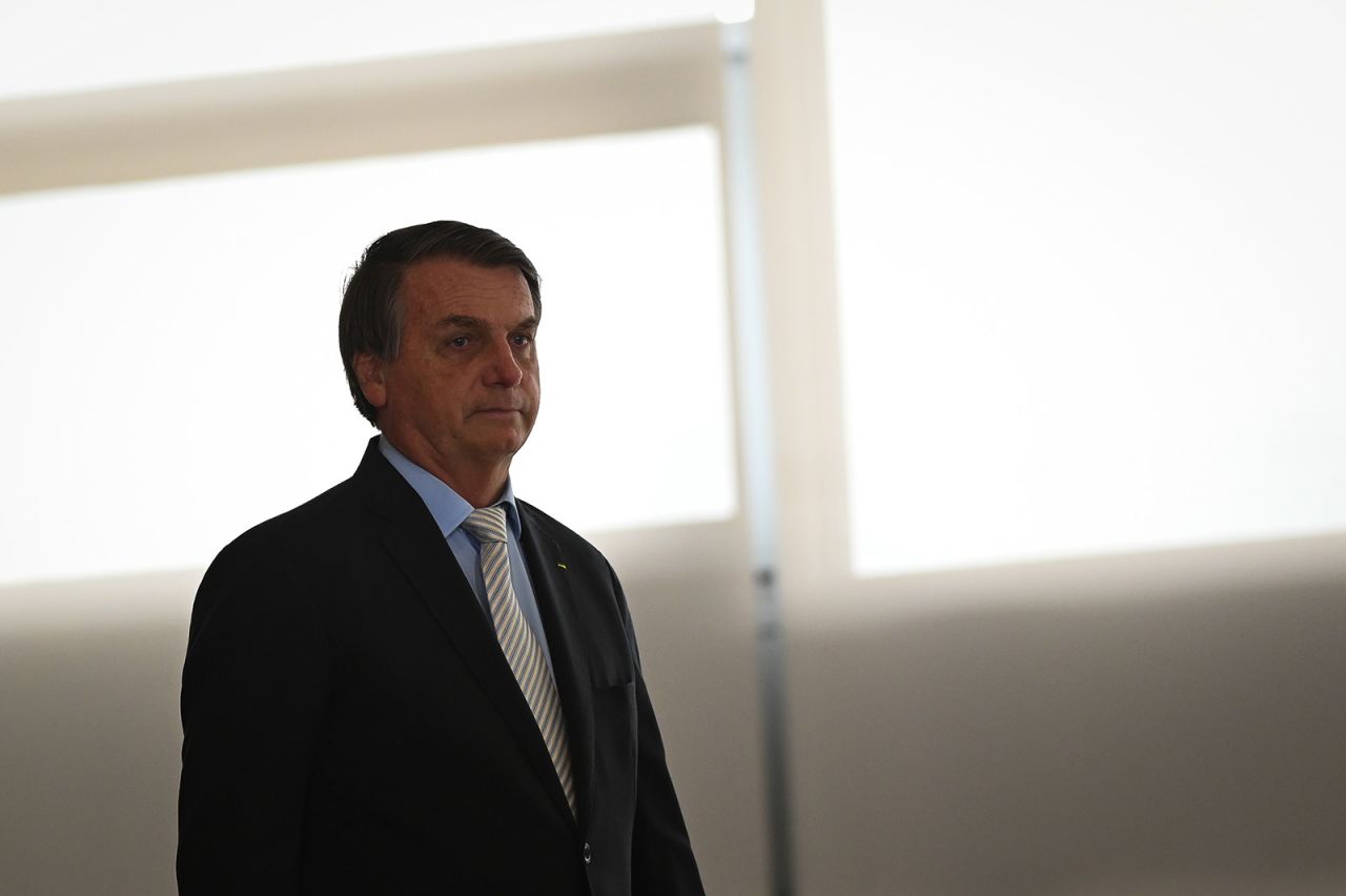 President of Brazil Jair Bolsonaro arrives for the opening ceremony of the forum "The Control in Combating Corruption" at Planalto Palace on December 9, 2020 in Brasilia.?