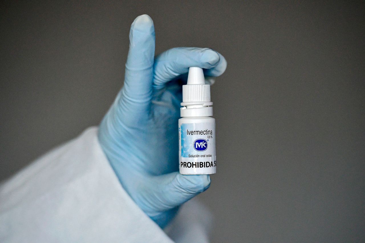 A health worker shows a bottle of Ivermectin in Cali, Colombia, on July 21, 2020. 