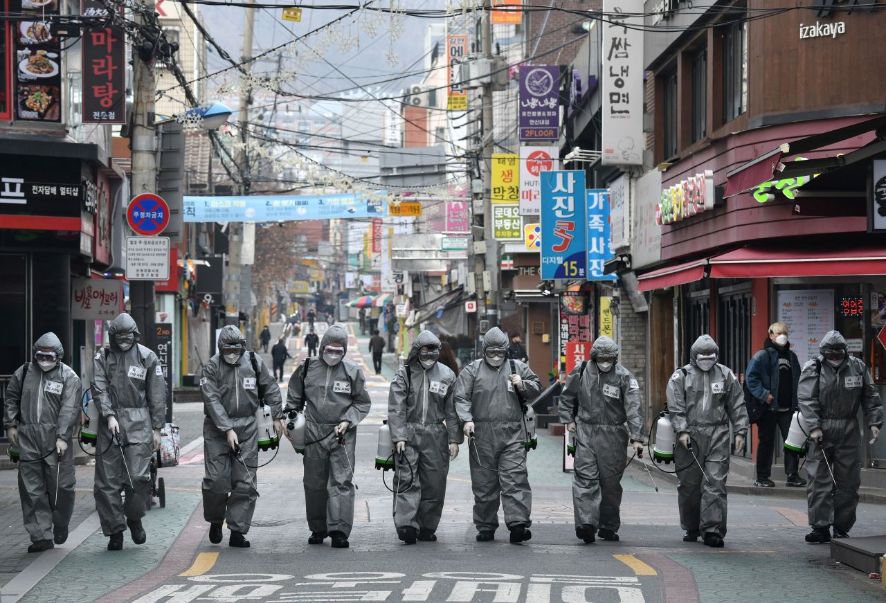 South Korean soldiers spray disinfectant in Seoul on March 4.