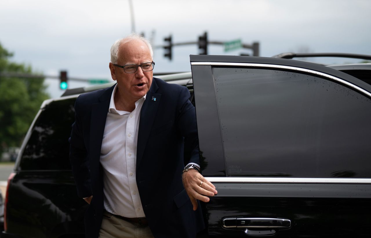 Minnesota Gov. Tim Walz arrives to speak at a press conference in Bloomington, Minnesota, on August 1.