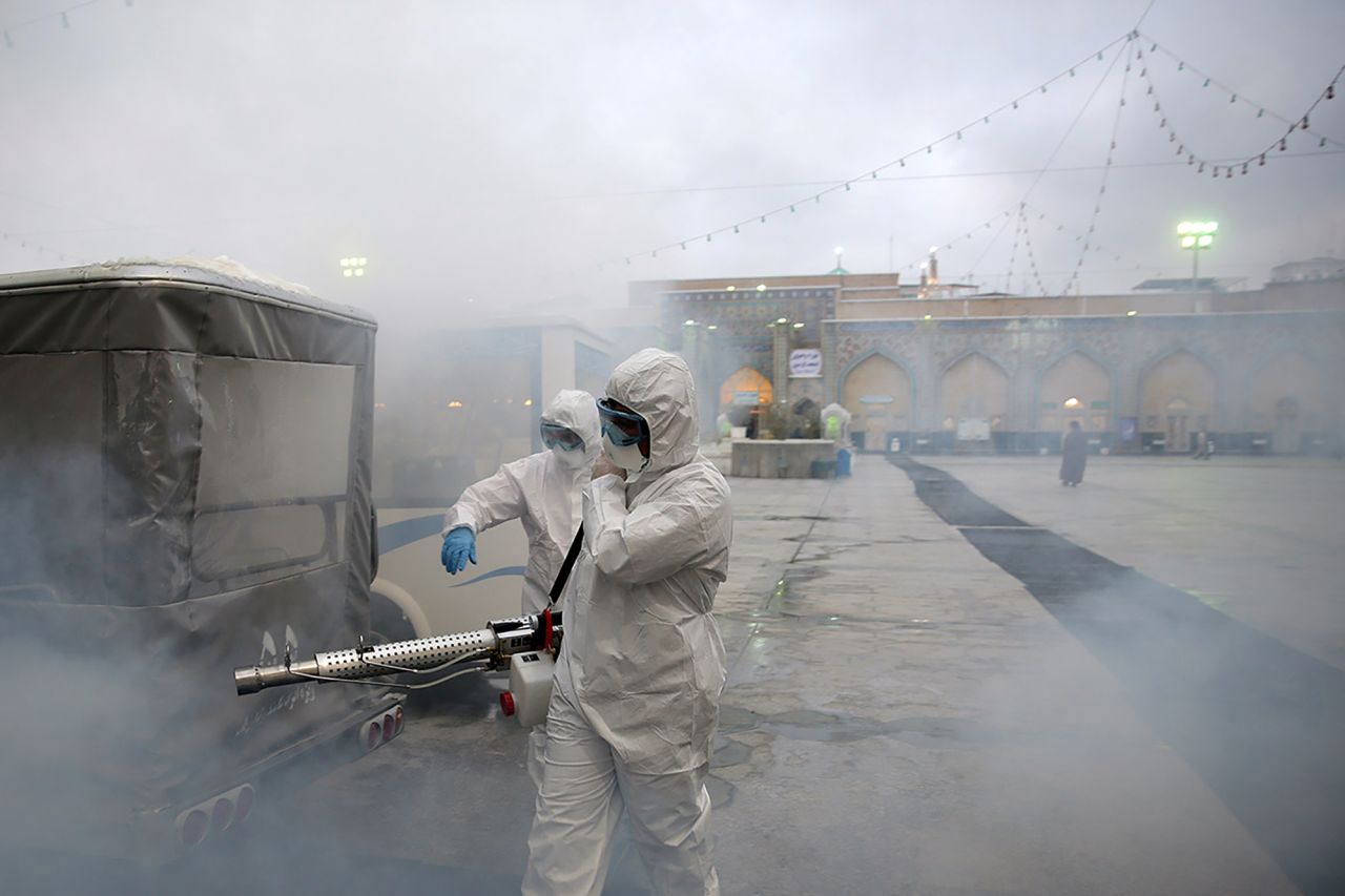 Members of a medical team spray disinfectant to sanitize around Imam Reza's holy shrine, following the coronavirus outbreak, in Mashhad, Iran February 27. 