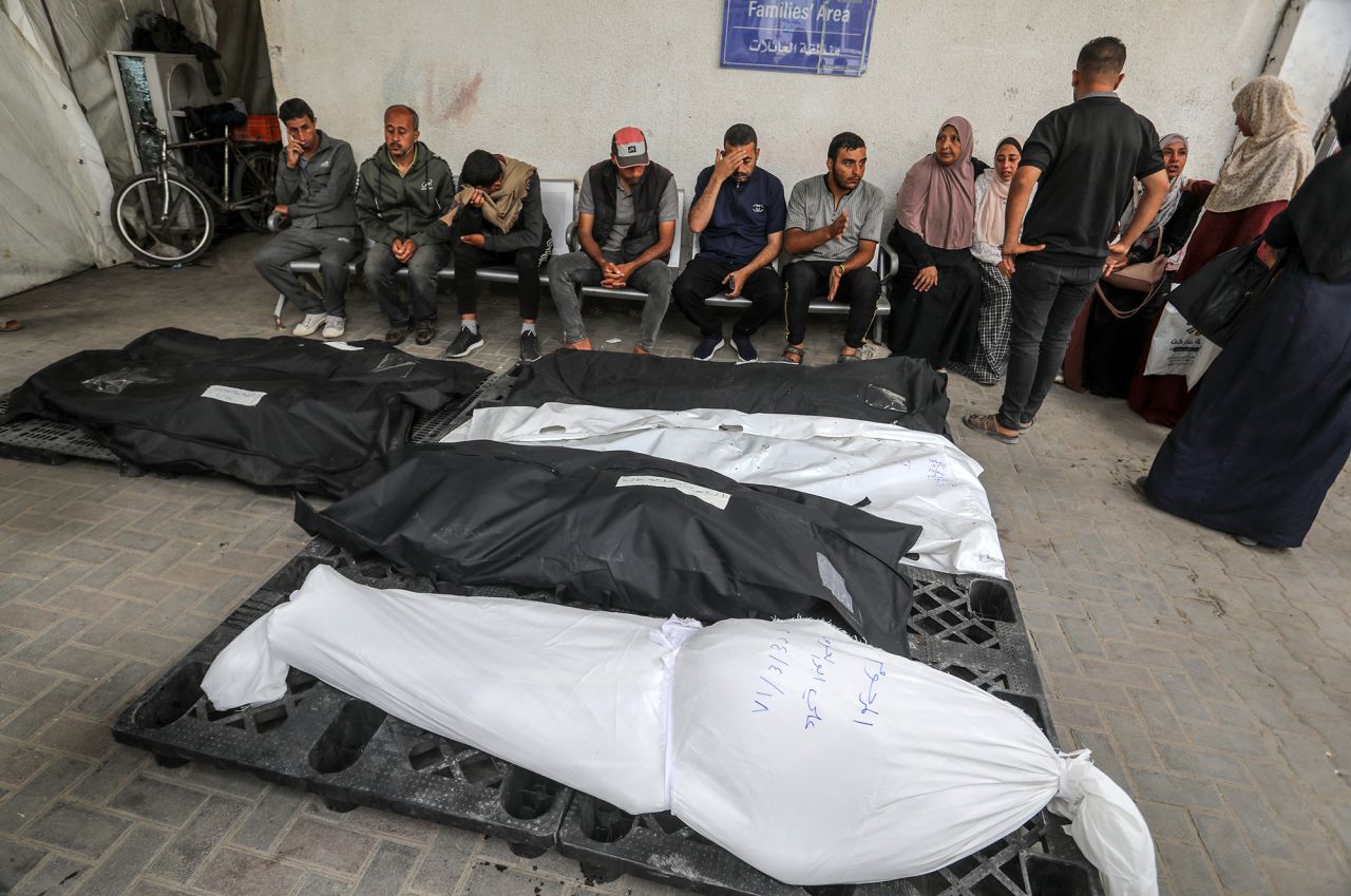 Relatives of Palestinian victims who lost their life after an Israeli airstrike take their bodies from morgue of El-Najar Hospital for burial in Rafah, Gaza, on April 18.