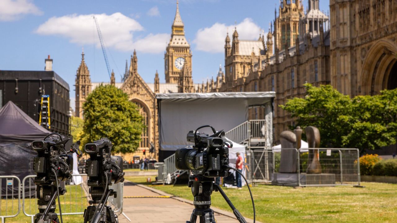 Members of the media set up broadcast positions in view of the Houses of Parliament in London, on Thursday, July 4. 