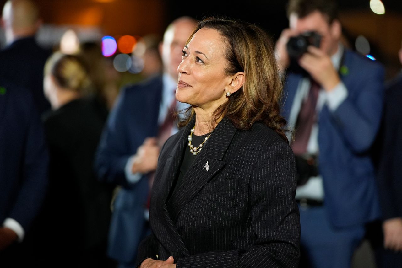 Vice President Kamala Harris watches as Evan Gershkovich, Alsu Kurmasheva and Paul Whelan reunite with family members at Joint Base Andrews on Thursday.