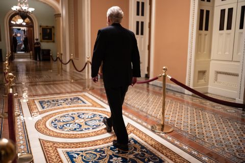 Senate Majority Leader Mitch McConnell walks to the Senate Floor at the US Capitol on December 21, in Washington, DC.