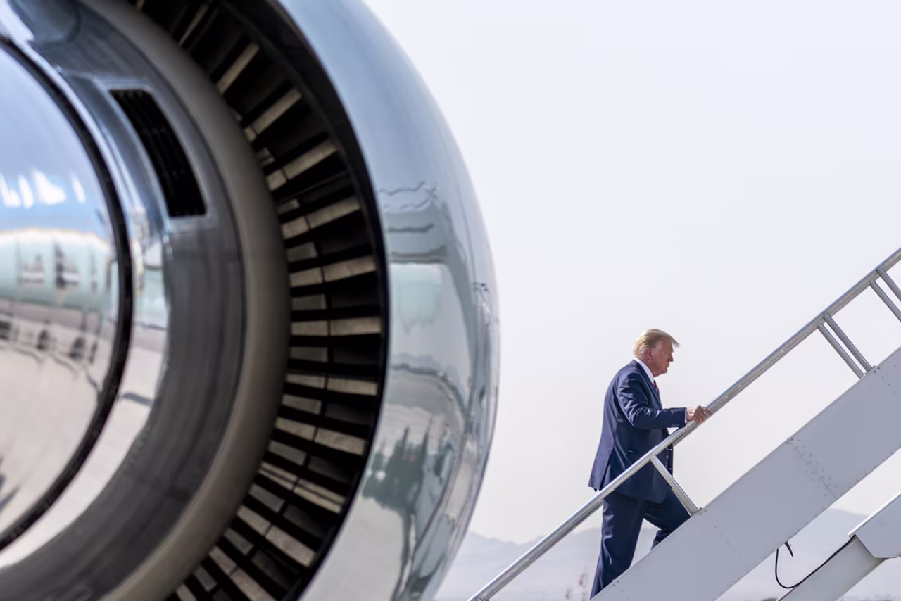 President Donald Trump boards Air Force One in Las Vegas on Monday to travel to Sacramento for a briefing on wildfires.