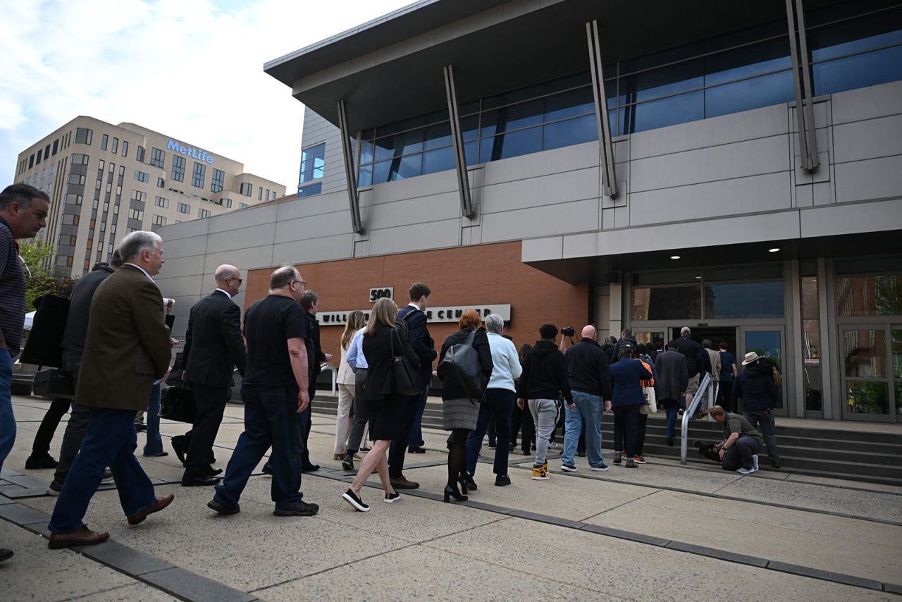 Members of the public wait to enter the Leonard Williams Justice Center where the Dominion Voting Systems defamation trial against FOX News is taking place on April 18 in Wilmington, Delaware.