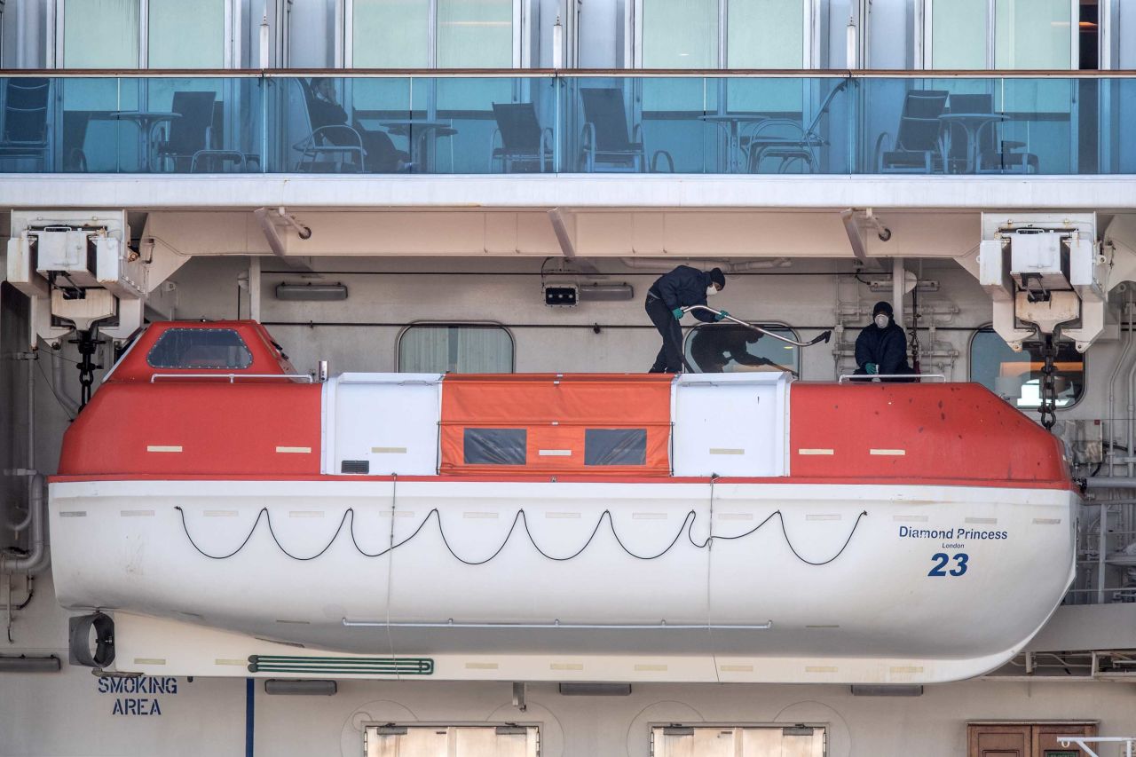 Crew members carry out maintenance on the Diamond Princess cruise ship docked in Yokohama, Japan on February 11.