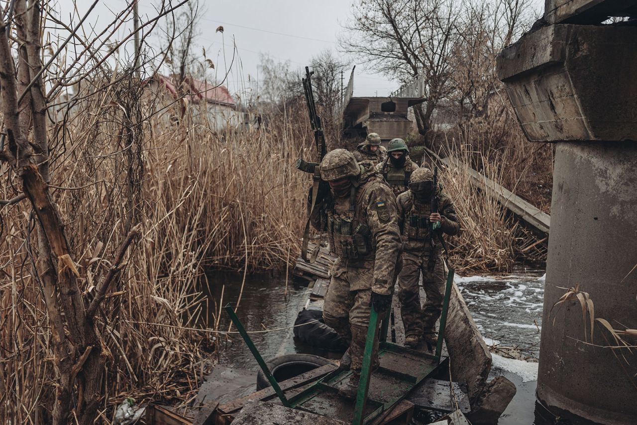 Ukrainian soldiers walk to the frontline in Bakhmut, Ukraine, on December 16. 