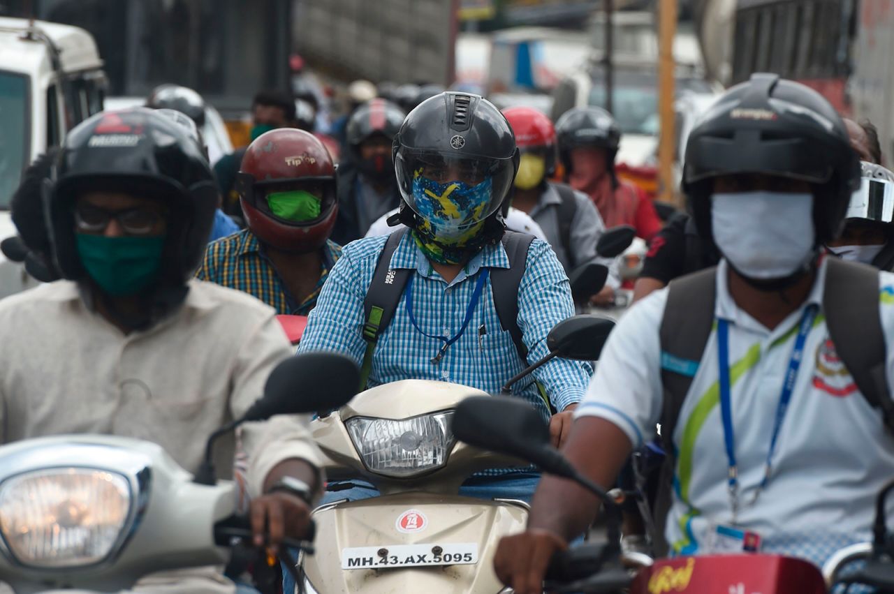 Commuters are seen in a traffic jam during rush hour in Mumbai on June 8.