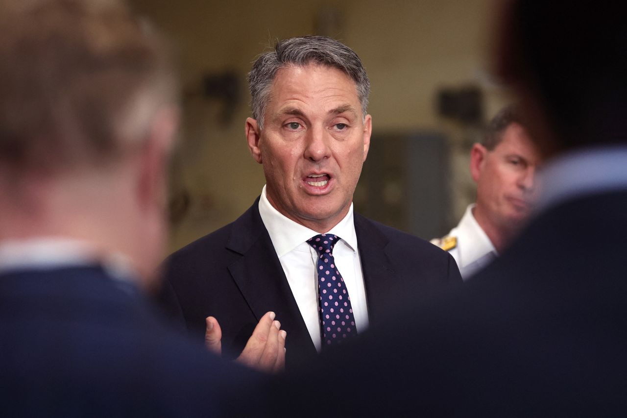 Australia's Defence Minister Richard Marles speaks during a press conference aboard the Australian Navy ship HMAS Canberra in Sydney, Australia, on February 20.