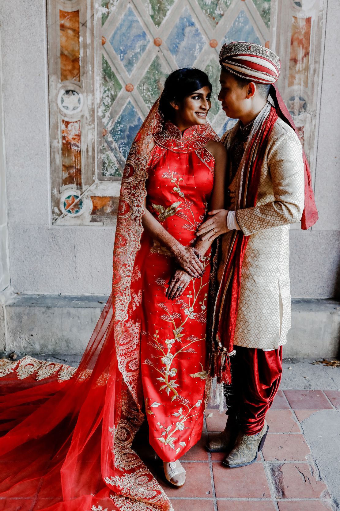 East-Meets-Dress created this dress for a Chinese-Indian wedding. It was paired with a bridal dupatta created from red and gold fabric and with Indian design motifs.