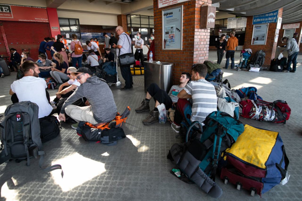 Tourists from Germany who have been stranded in Nepal due to the government-imposed lock down amid concerns over the spread of coronavirus wait for their chartered flight back home at Tribhuvan International Airport in Kathmandu.