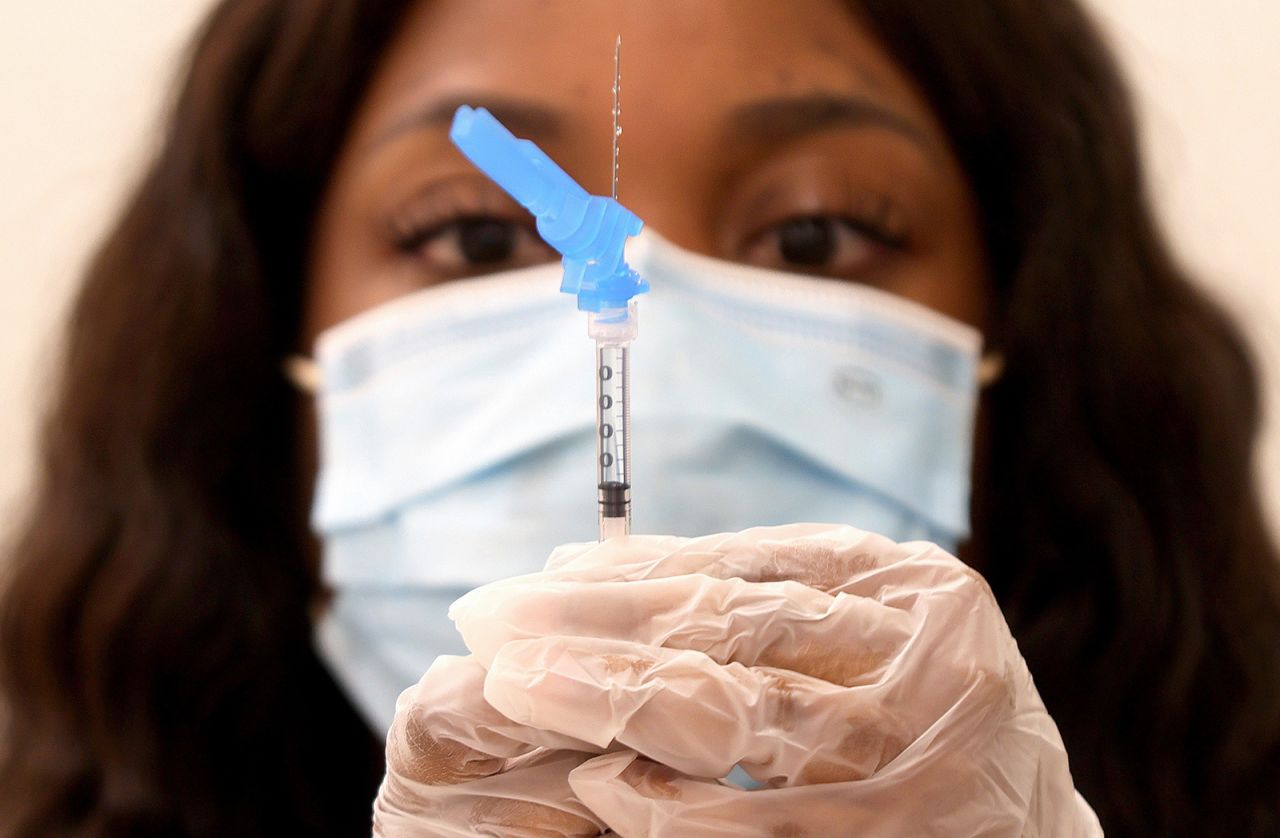 A dose of the Johnson & Johnson Covid-19 vaccine is prepared at a vaccination event in Los Angeles on March 11.