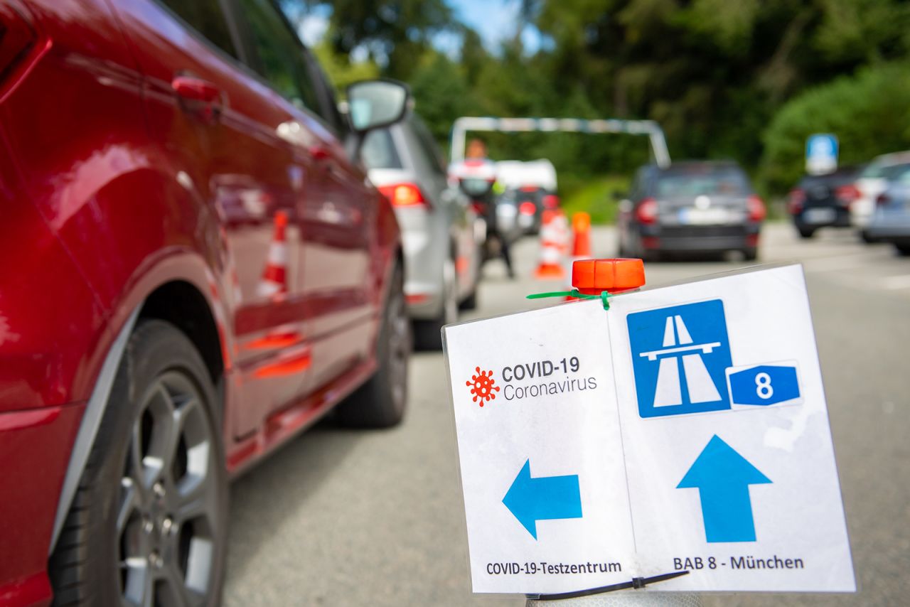 A testing center sign is pictured for vacation returnees at a rest stop on the A8 highway near Traunstein, Germany, on August 20.