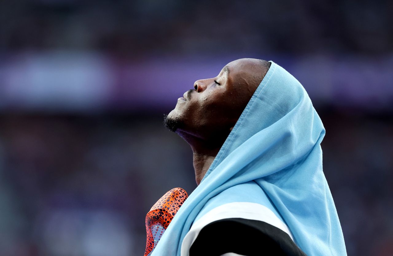 Letsile Tebogo of Botswana celebrates winning the gold medal after competing in the men's 200m final. 