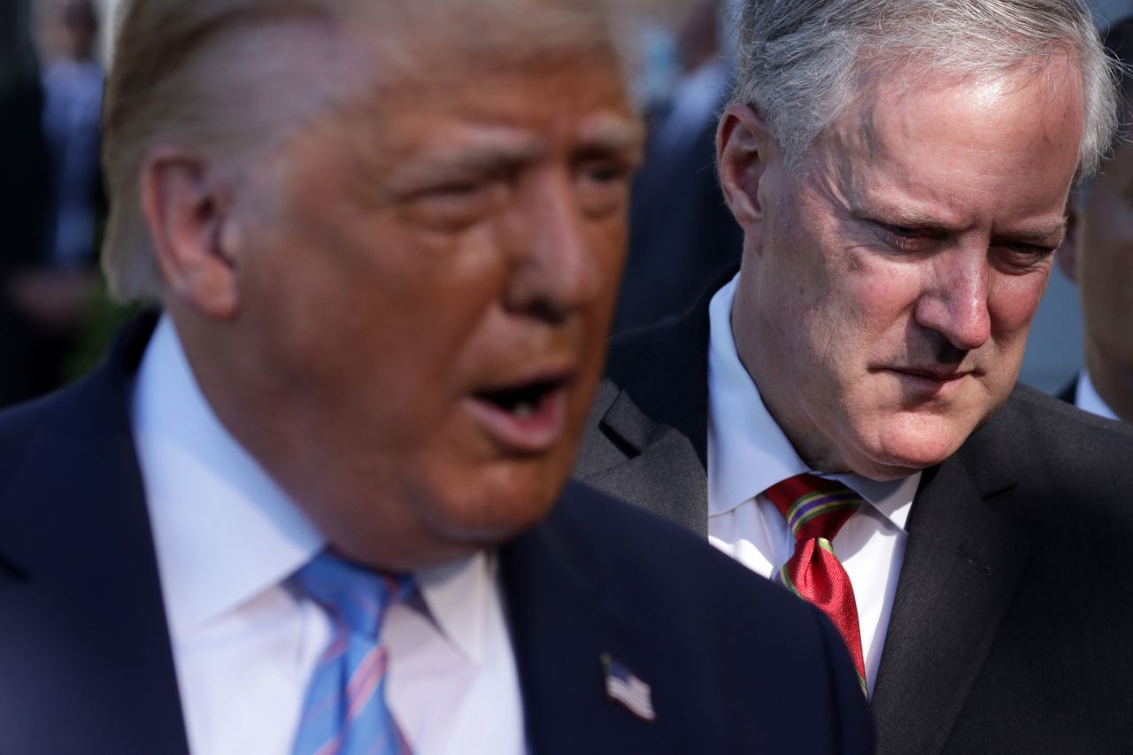 Mark Meadows listens as then-President Donald Trump speaks from the South Lawn of the White House in July 2020.