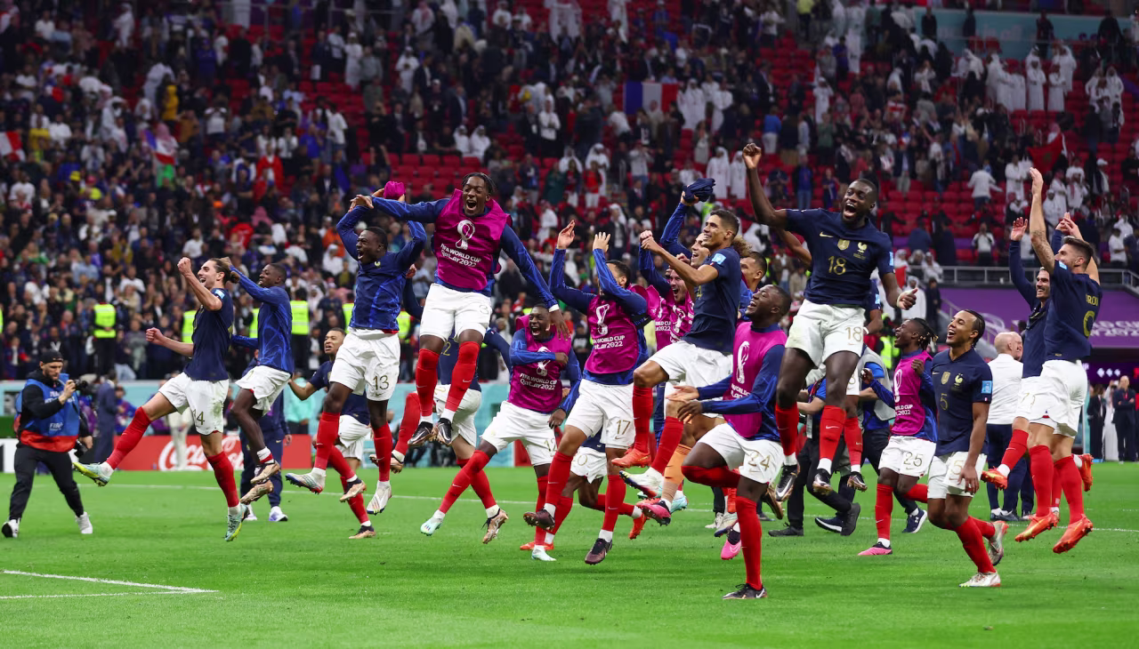 France players celebrate after the match as France progress to the semi-finals.